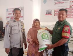 Babinsa Koramil 09/NL Dampingi Penyaluran Bantuan Beras Pemerintah di Desa Sei Tampang